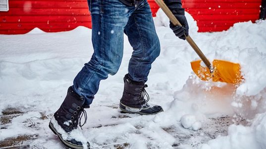 green snow shoveling